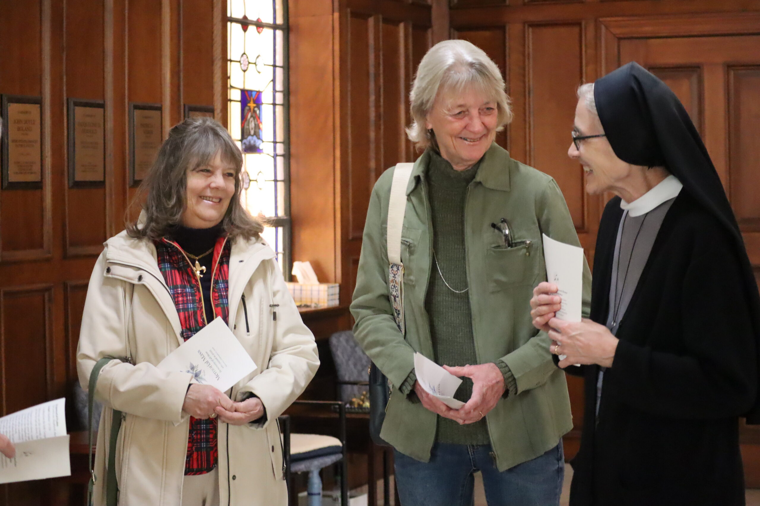 IMG_4282 Sister M. Michael talking with two women in the Chapel