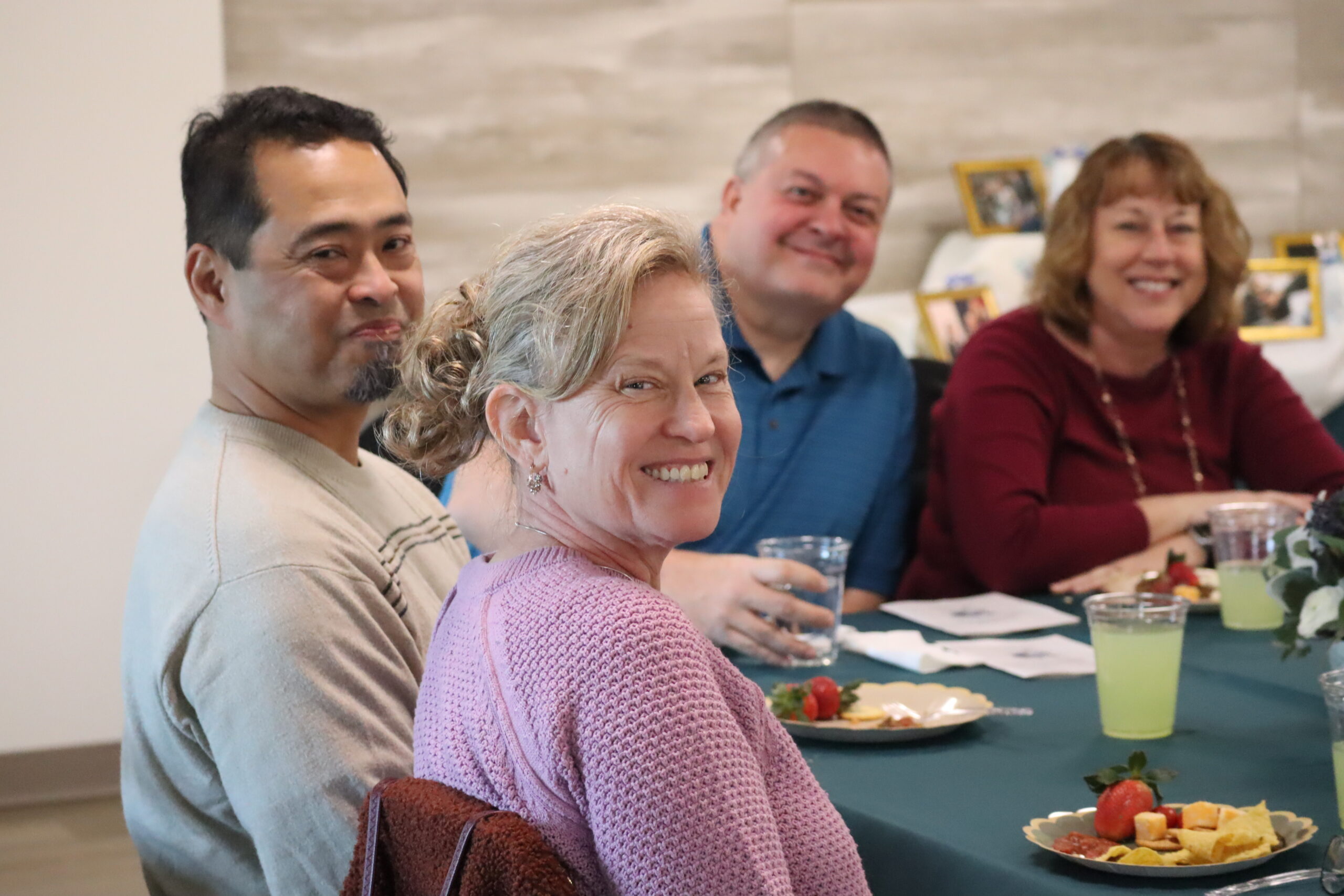 IMG_4312 Family members at a table smiling