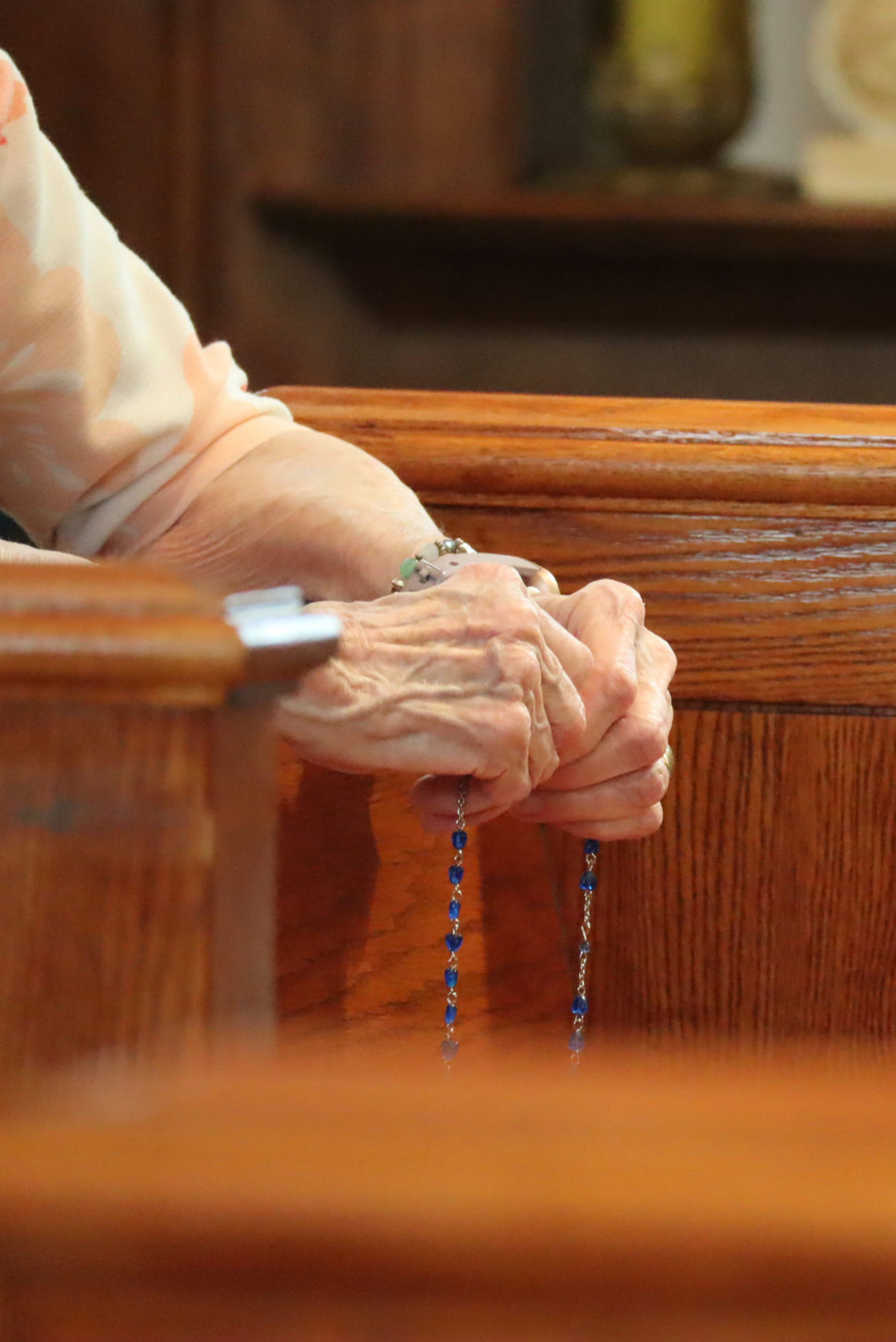 IMG_1528 (1) Hands holding a rosary