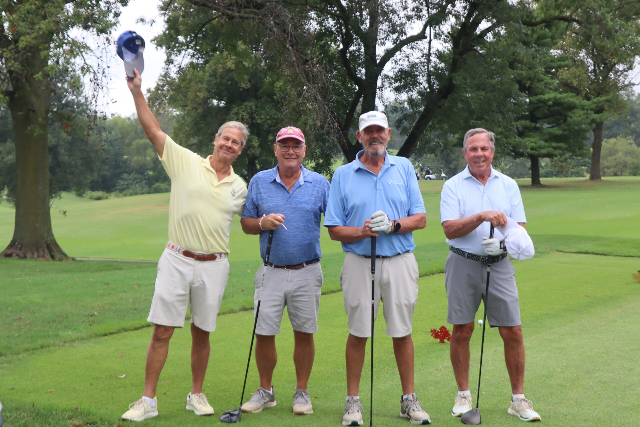 IMG_6634 A golf foursome posing for a picture