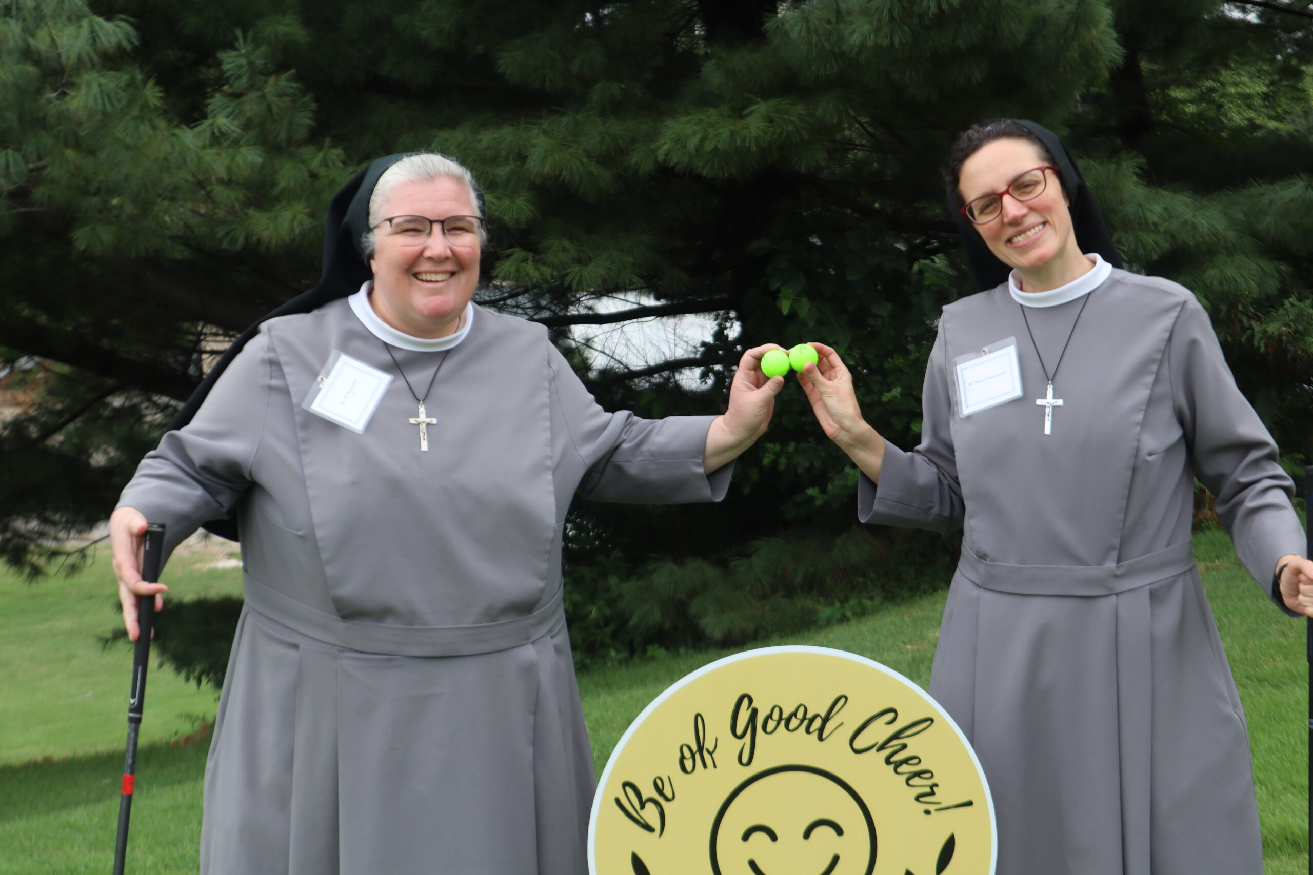 IMG_6733 Two sisters posing with golf balls