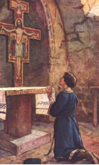St francis praying in front of a crucifix